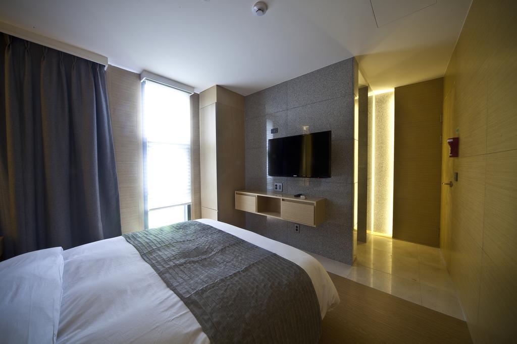 Stanford Hotel And Resort Jeju Habitación foto